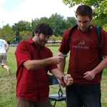 Professor Schwartz demonstrates flint-knapping techniques.